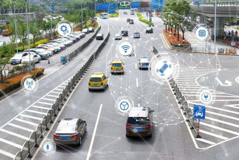 A connected city street, sensors tuning the flow of traffic.